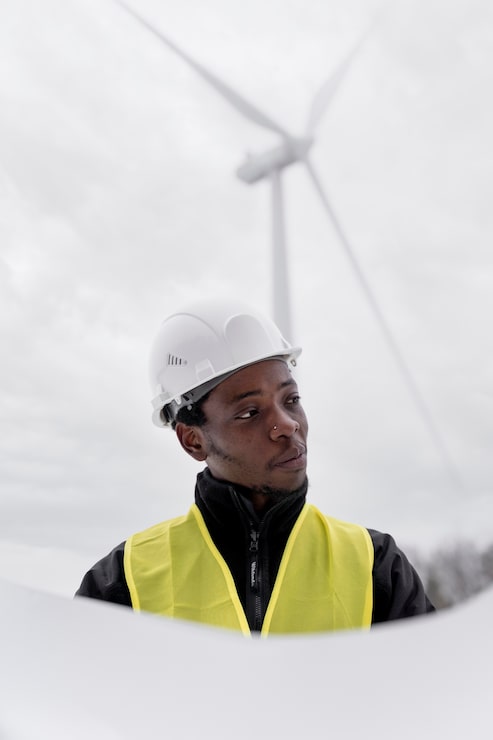 medium-shot-environmental-engineer-holding-plan_23-2149353966